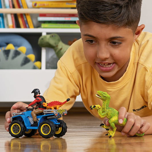 Quad échappe au vélociraptor
