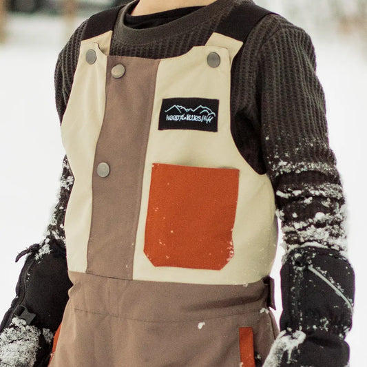 Salopette de ski imperméable et isolée | Pour que les petits puissent jouer dehors