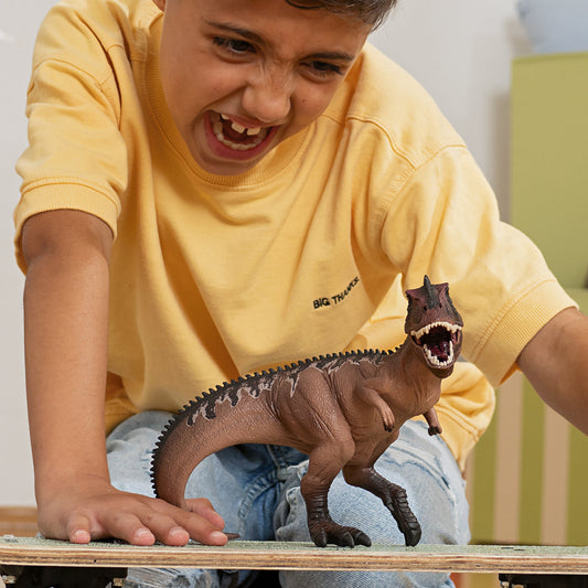 Figurine de Giganotosaurus préhistorique