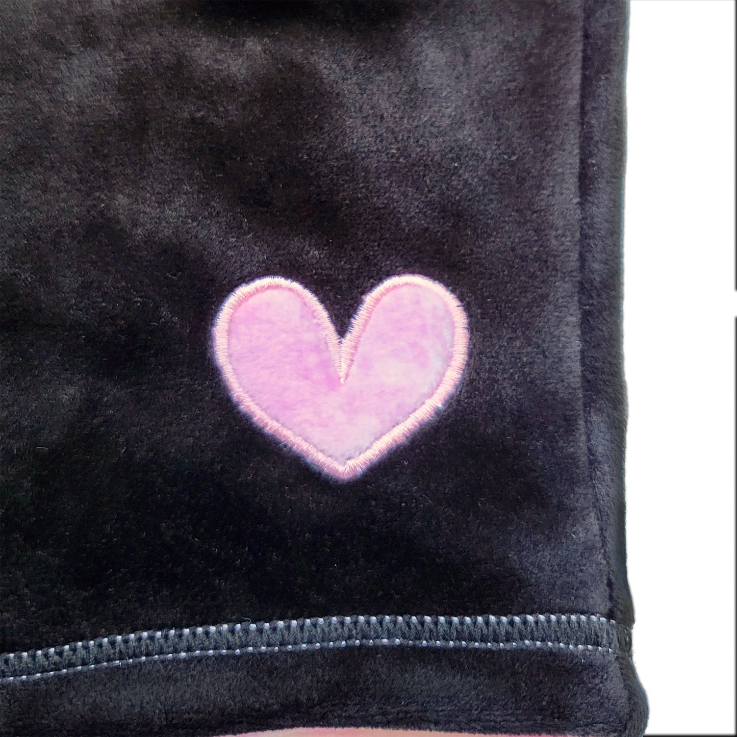 Cagoule réversible micropolaire noire cœur pivoine rose