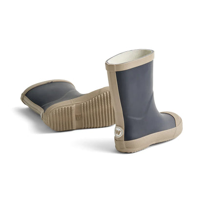 Botte en caoutchouc boueuse | Encre | BLÉ