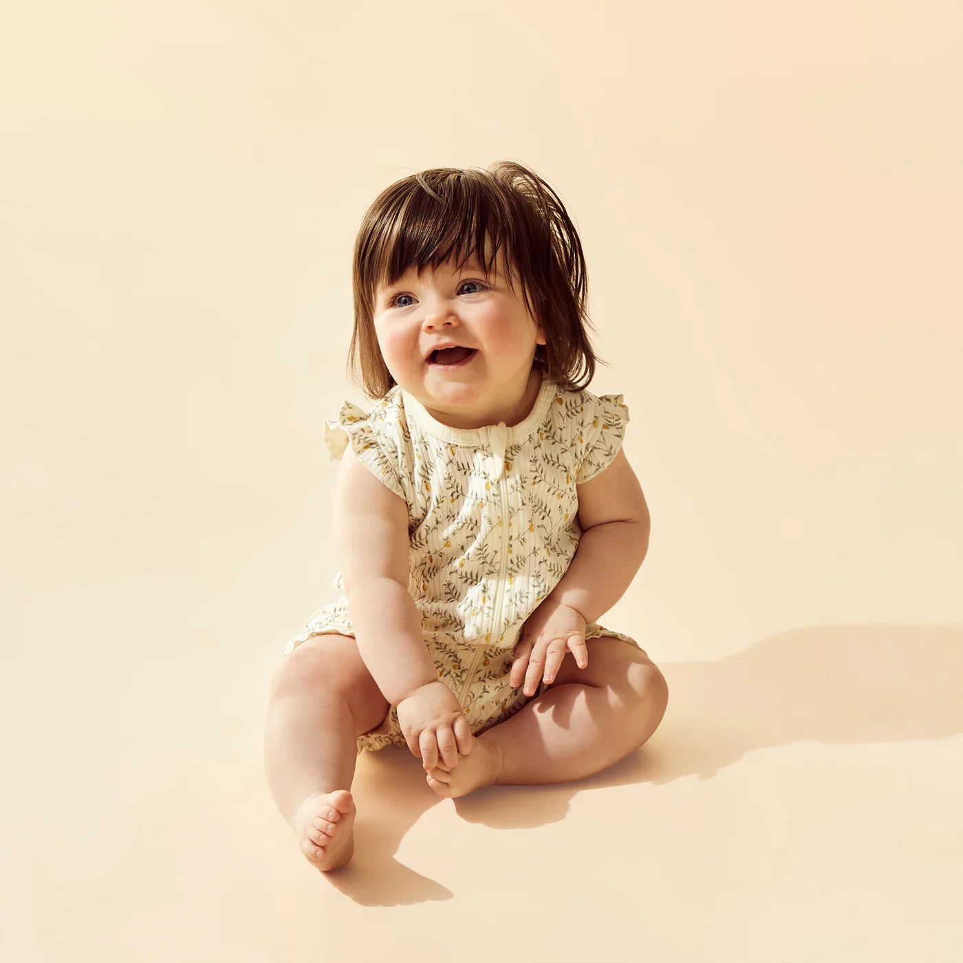 Lemon Leaf Organic Ruffle Zipsuit | Wilson + Frenchy