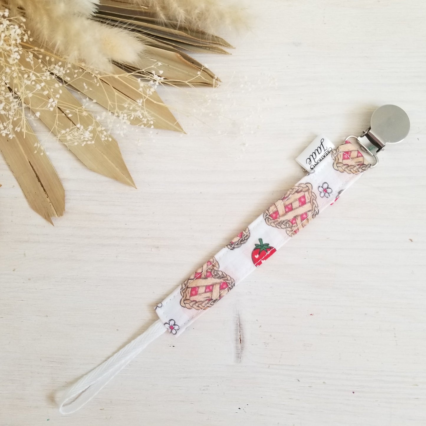 Nouveauté - Attache-suce Tissu - Clip inox - tarte aux fraises